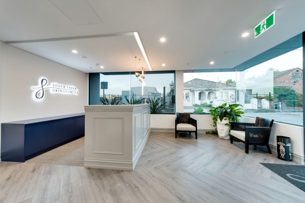 South Yarra Orthodontic’s abundance of natural light on full display through expansive windows as a key dental clinic design element